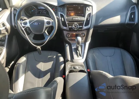 2014 Ford Focus Titanium из США, поврежденный, VIN 1FADP3N24EL269008